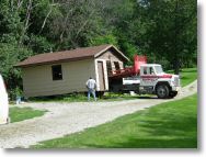 Jacking the garage up onto the truck