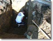 Drilling through the foundation for the water pipe