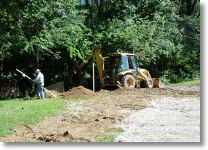 Starting to excavate for the back foundation wall