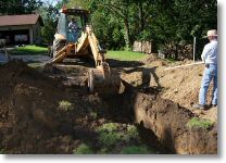 excavating the front foundation wall