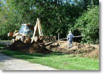 excavating the front foundation wall