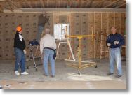 Starting the sheetrock on the ceiling