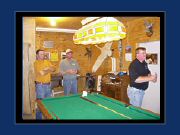 Tim, Billy and Bob at the dart board.